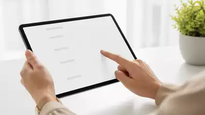 User submitting online form on tablet